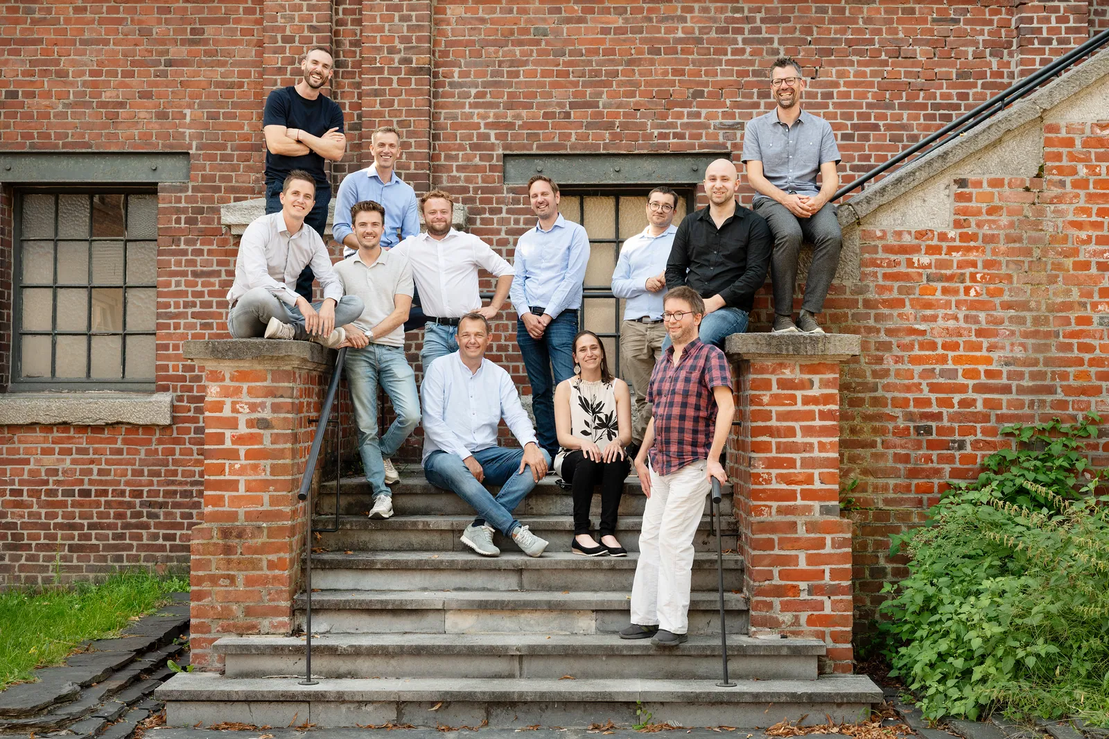 The Arkite team on the stairs of the C-Mine site in Genk